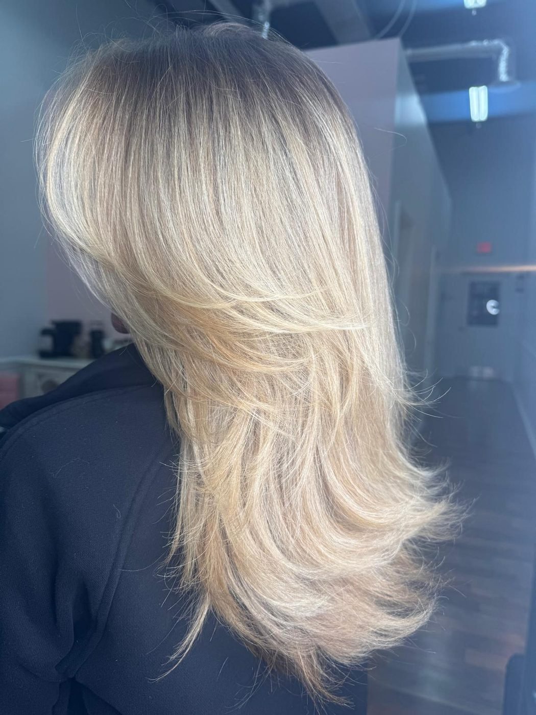 Bright blonde with feathered layers
